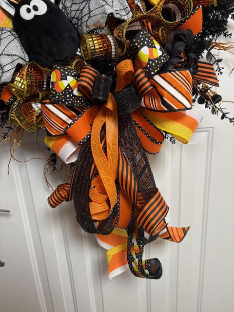 Oversized Halloween Wreath, Trick or Treat sign, Plush Bats, Candy Corn, Glitter Moon and an Oversized Bow