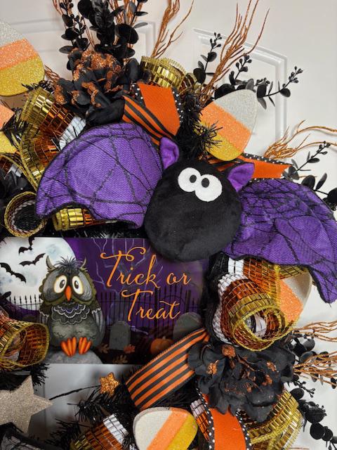Oversized Halloween Wreath, Trick or Treat sign, Plush Bats, Candy Corn, Glitter Moon and an Oversized Bow