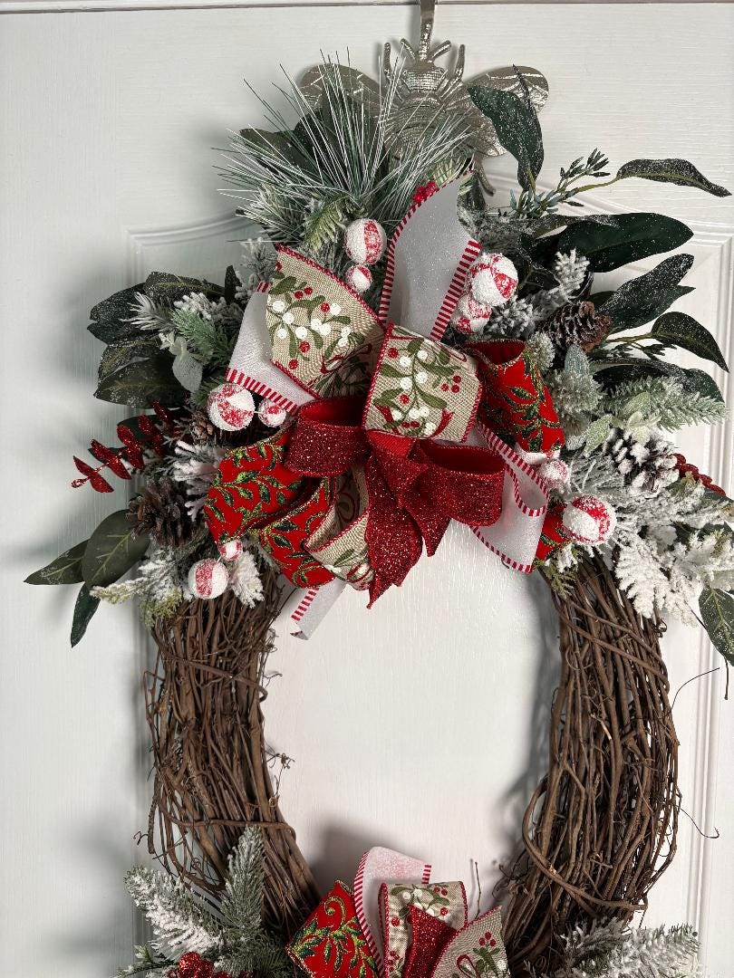 Christmas Holiday Oval Grapevine Wreath 20x 48 Inches  Pine Foliage, Winter Greens & Red Glitter and Holiday Print Bow